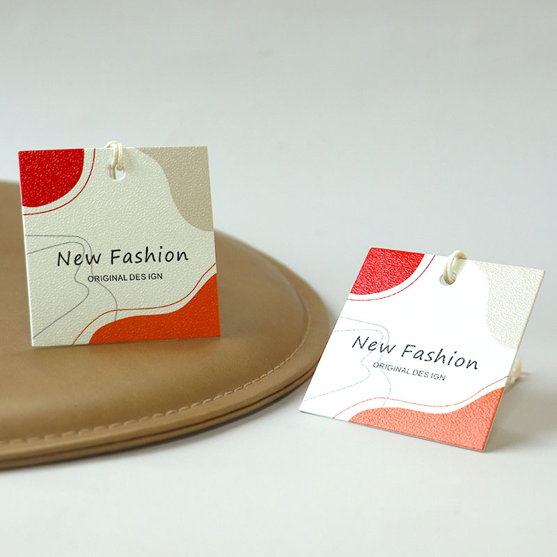 服装吊牌定做加厚衣服商标标签订制女装蛋壳纹挂卡定制童装价格签