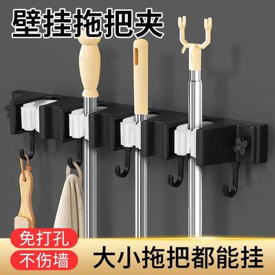 Wall-mounted mop holder with adhesive hooks, no drilling req