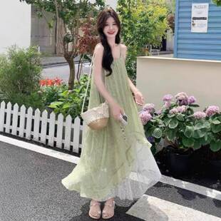 森系绿野仙踪度假风蕾丝拼接吊带连衣裙女款浪漫独特绝美长裙