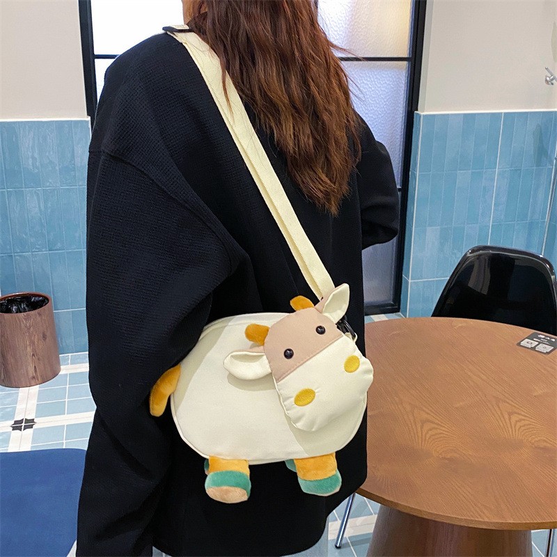 卡通丑萌新款可爱搞怪女生斜跨包