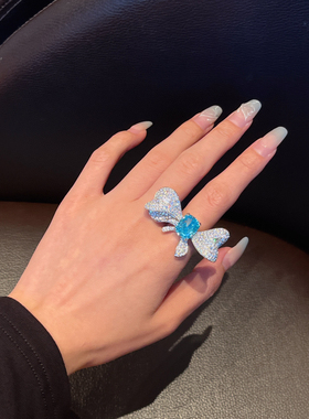 高碳钻冰花切蝴蝶结帕拉伊巴纯银镀18K金戒指 豪华满镶