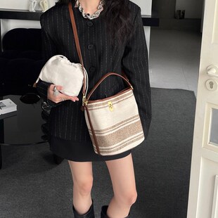 大容量编织水桶包女2025新款美式风帆布包轻奢小众子母单肩斜挎包