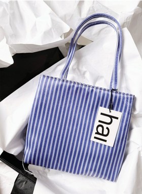 蓝色条纹包包高级感2025新款手提单肩腋下拼撞色小清新hai缎面包