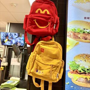 麦当劳周边休闲大高中学生ins双肩包旅行校园背包轻便携儿童书包