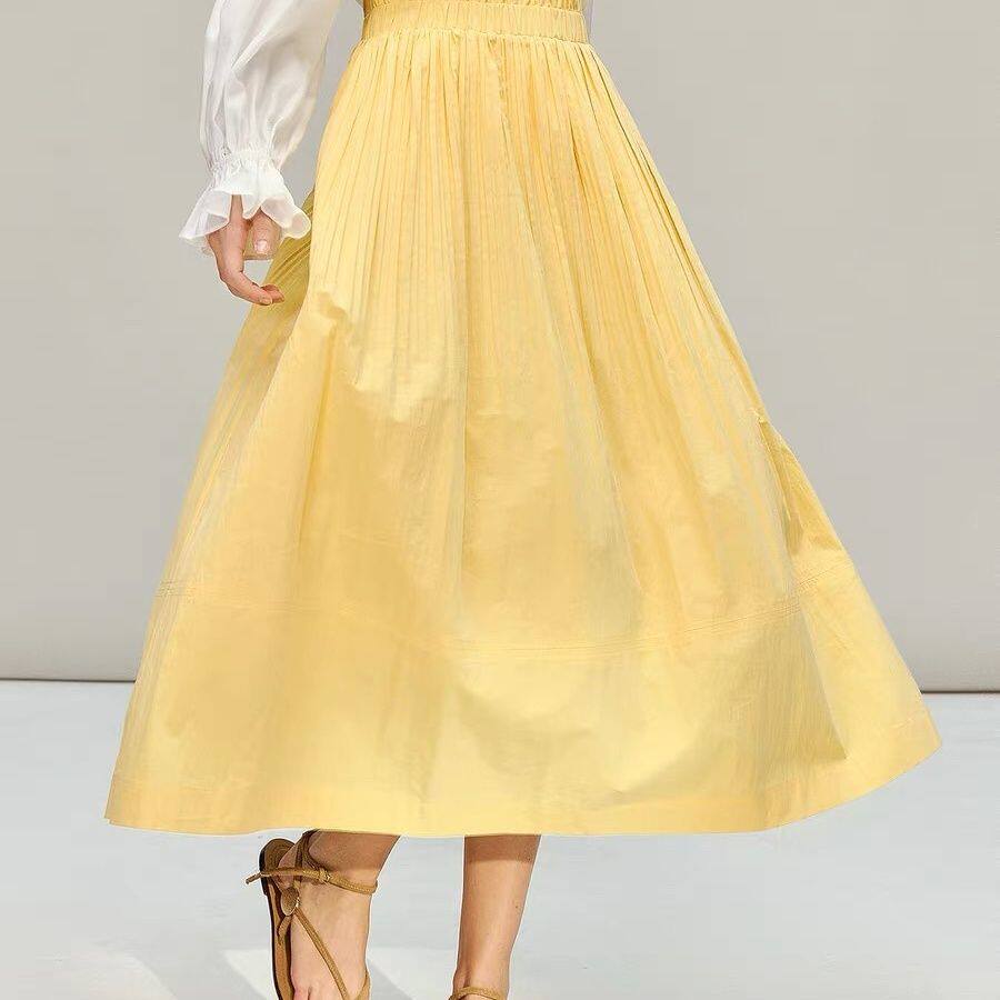 黄玫瑰压褶木耳边鹅黄色半身裙女2026年春季中长款遮肉高腰伞裙