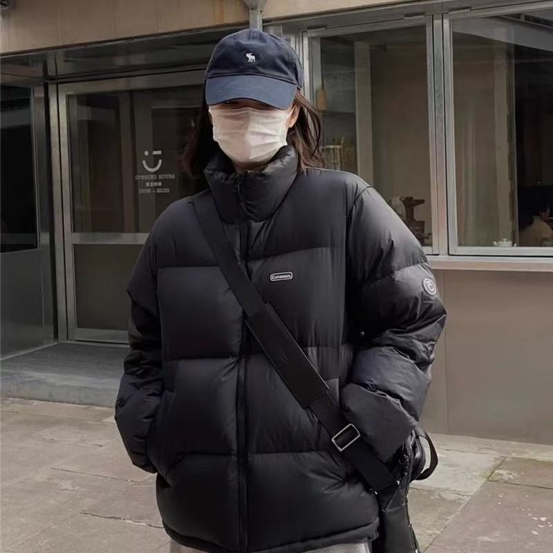 90白鸭绒黑色加厚羽绒服外套女