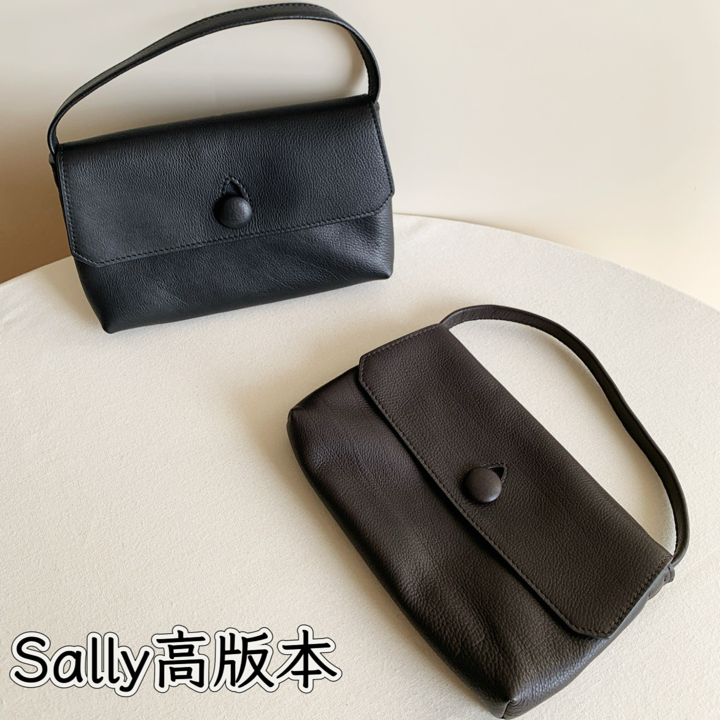 极简主义row系原厂牛皮Sally纽扣翻盖手提迷你包图片