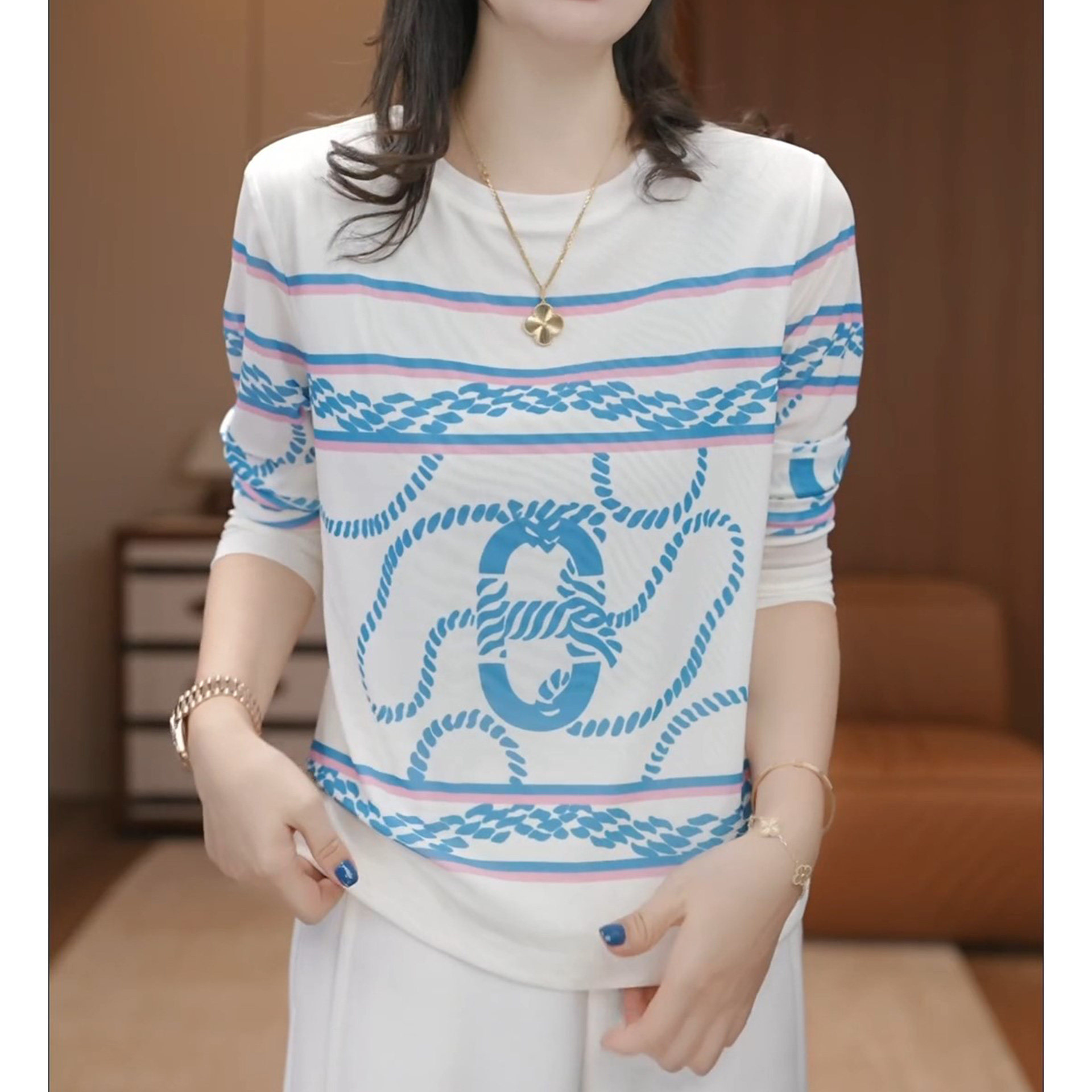 早秋休闲印花显瘦长袖皮肤衣T恤女时尚气质百搭设计感打底衫上衣