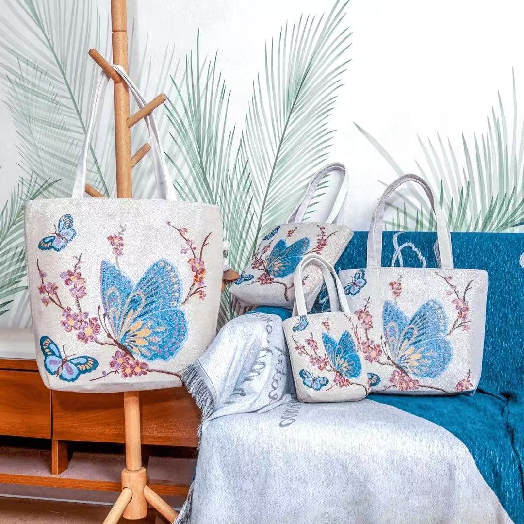 百搭蝴蝶双面刺绣帆布包手提包手拎包外出化妆包手机包通勤便当包