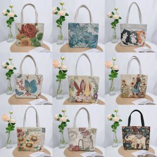 时尚双面刺绣帆布包手提包手拎外出百搭精致化妆包手机包上班小拎