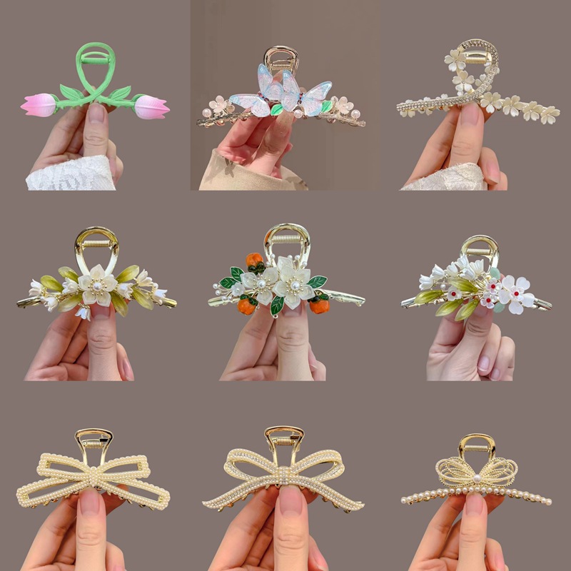 奥特莱斯感优雅珍珠花朵水钻抓夹国潮气质盘头网红发夹后脑勺鲨鱼