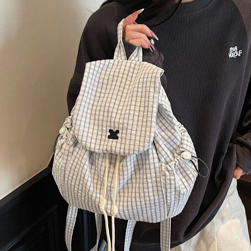 小众清新格子双肩包女2025新款潮韩国学院风休闲背包学生水桶包
