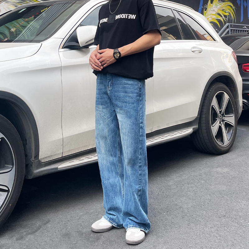 设计敢纹理扎花牛仔裤