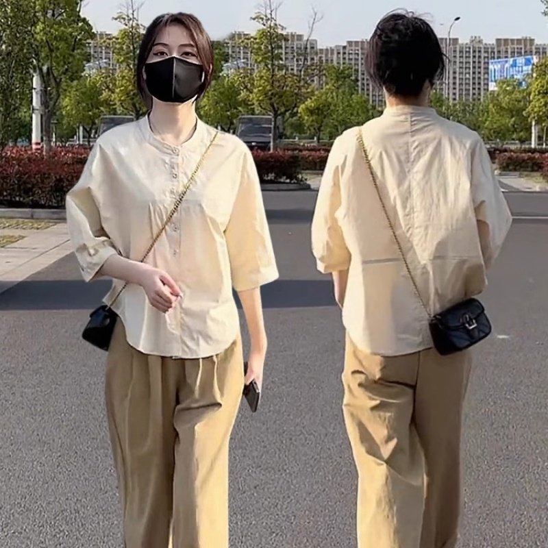 新款女士休闲时尚显瘦遮肚子套装图片