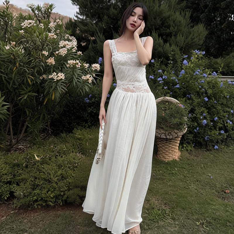 法式白色蕾丝吊带连衣裙女夏季海边度假巨好看气质修身露背长裙子