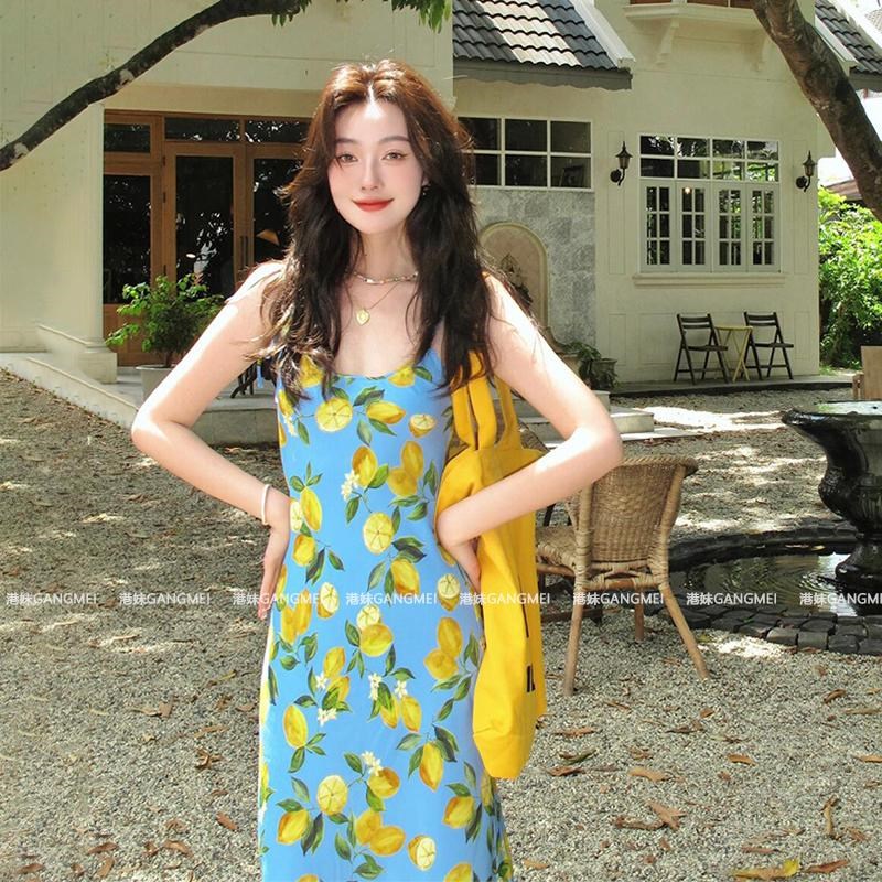 马尔代夫海边度假沙滩裙法式柠檬印花蓝色吊带连衣裙女夏a字长裙