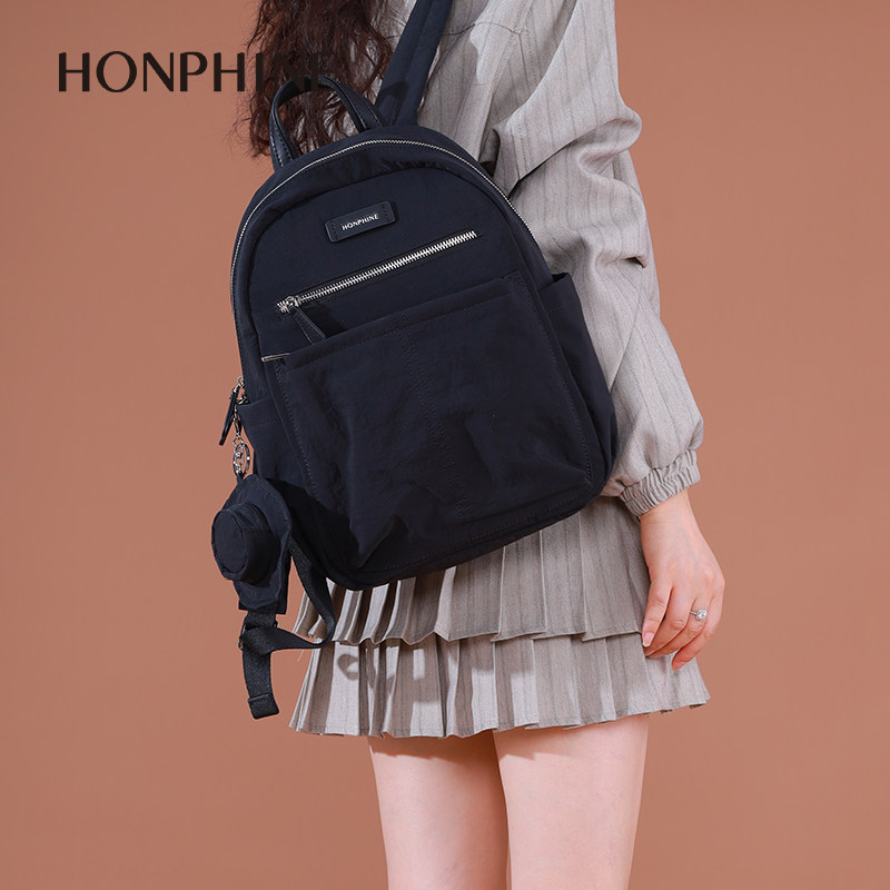 红粉知己双肩包女2026春新款轻便大容量多功能背包黑色简约帆布包