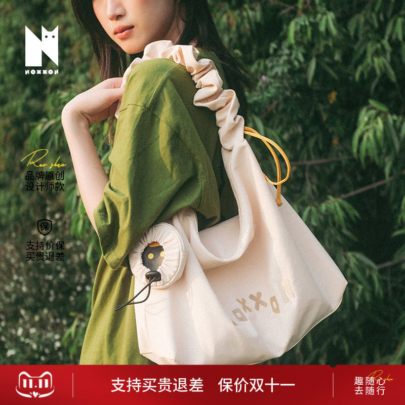 NOXXON偌闪女包包大容量单肩通勤托特包斜挎包猫猫风奶黄色腋下包
