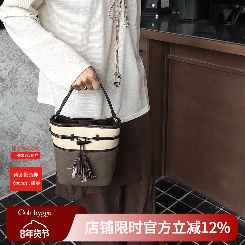 Oohhygge.咯咯小水桶包拼接撞色牛角扣装饰单肩斜跨手提通勤包包