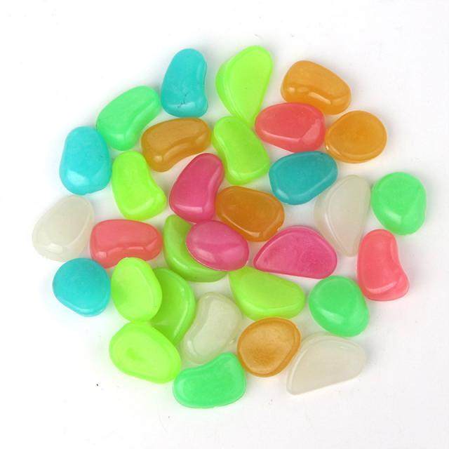 100pcs Glow in the Dark Garden Pebbles Glow Stones Rocks 适