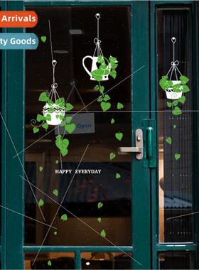 Hanging baskets potted green plants Shop glass door window s