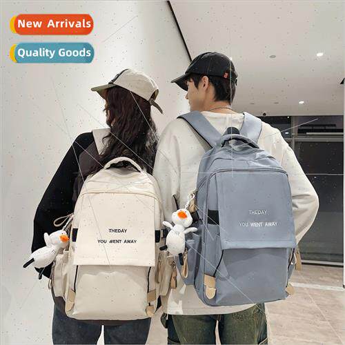 Schoolbag male new tide couple shoulder bag large capacy com