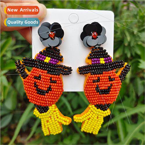 Europe new holiday earrings female niche fashion hand-stched