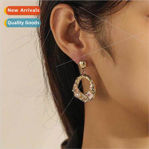 Korea new irregular hollow earrings senior pearl shell drop