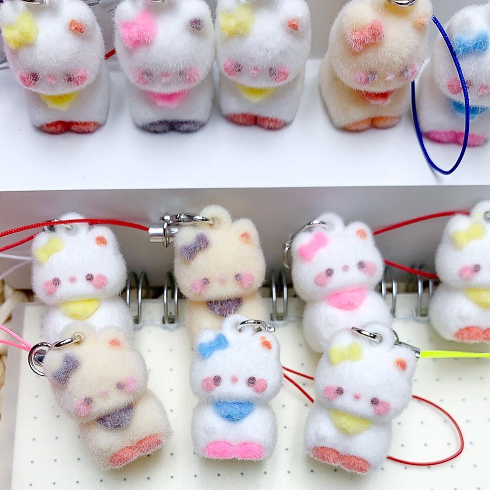 日系植绒小猫挂绳少女心送礼优选立体腮红猫咪玩偶手机壳装饰小礼图片