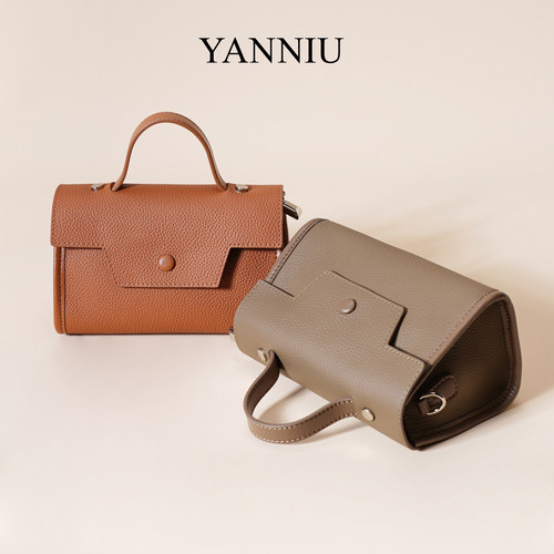 早秋斜挎包岩牛设计款复古休闲