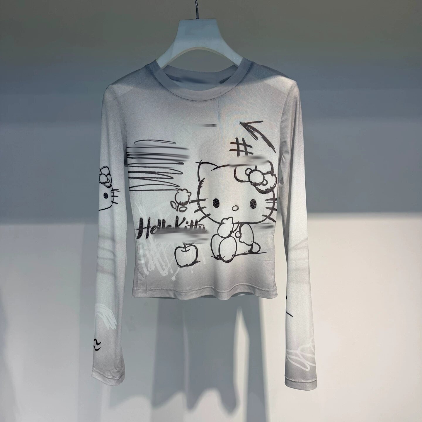 RREVANM芮范曼曼HelloKitty艺术线条涂鸦白色网纱单衣RK70801260