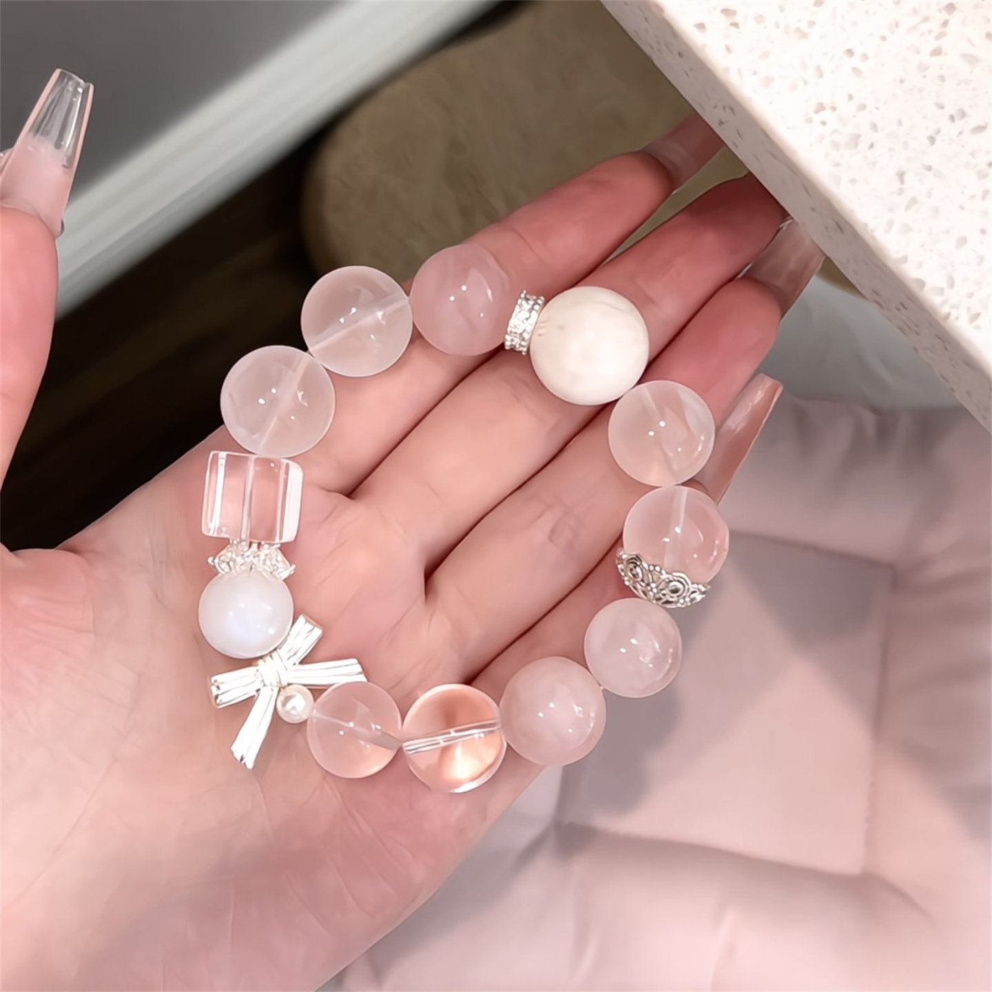 粉水晶白水晶白雪花幽灵手链图片