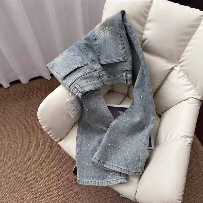 浅蓝色设计烫钻星星牛仔裤女早春小个子窄版马蹄裤显瘦拖地微喇裤