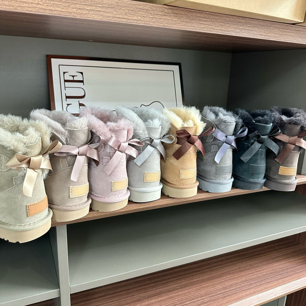 桑坡单丝带羊皮毛一体雪地靴蝴蝶结经典款低筒周冬雨丝带平底靴