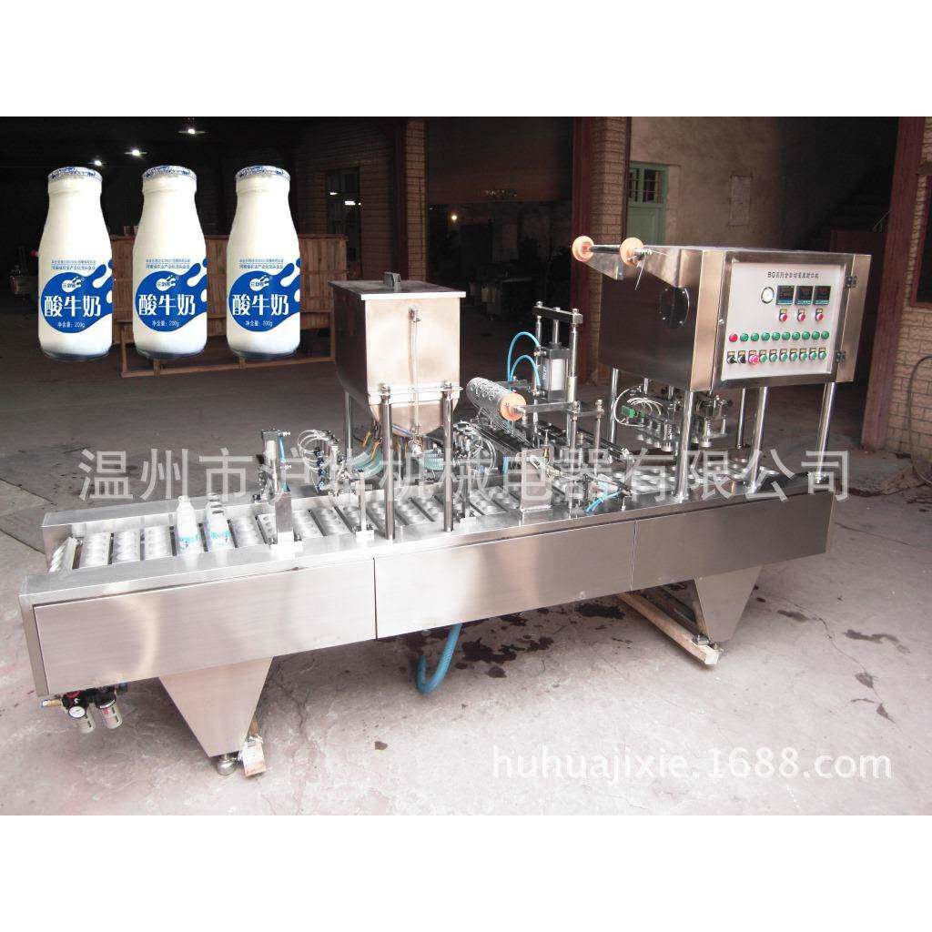 AD钙奶瓶装乳酸菌果汁饮料瓶装铝箔全自动灌装封口机沪华