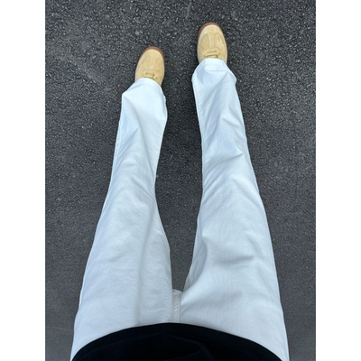 白色牛仔裤男款弯刀微喇裤