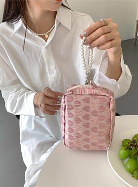 28172 Pearl charm tassel handheld cosmetic bag embossed Fren