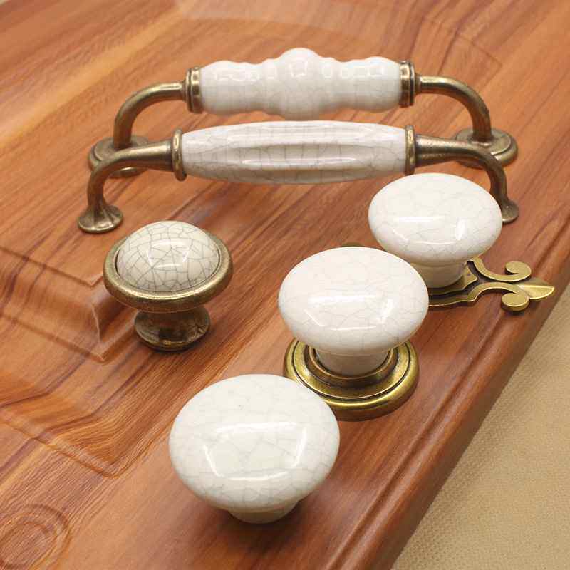 厂家直销裂纹陶瓷拉手欧式衣柜抽屉橱柜门单孔古铜仿古把手广东