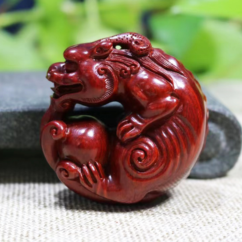 小叶紫檀手把件貔貅抱球木雕