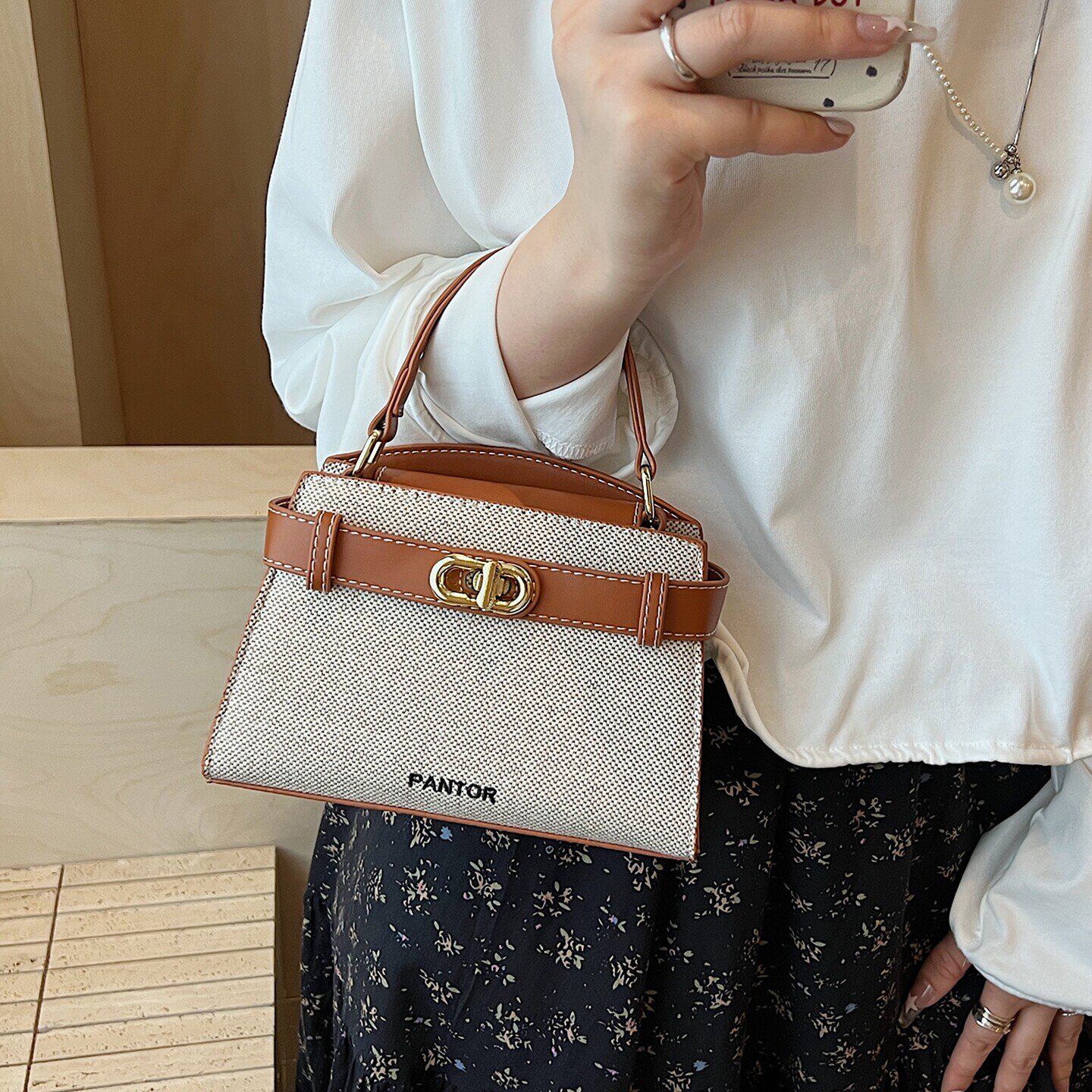 轻奢高级感女士包包2026新款潮休闲百搭通勤斜挎包帆布手节日礼品