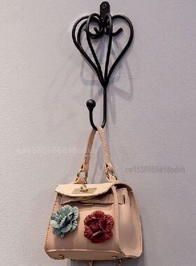 Children's Clothing Store Hooks Clothes on The Wall Sing