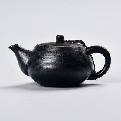 Black pottery teapot China kungfu tea set filter side anti