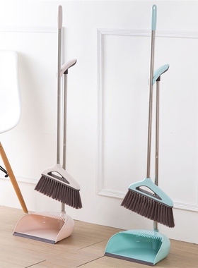 Two sets of home-made brooms for house-to-house scavengers a