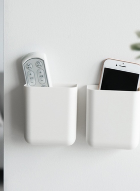 The wall-wall remote in the living room collects a box of wa