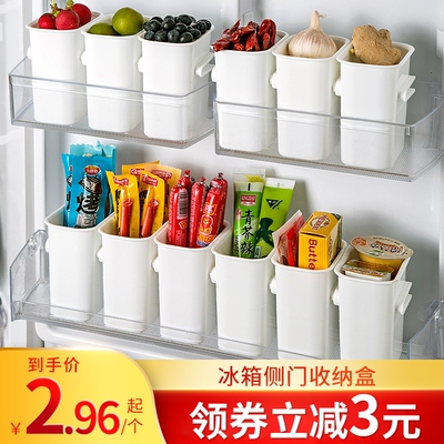 The side door of the fridge contains food-sort-sorted kitche