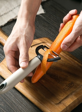 The kitchen's multi-purpose fruit cutter is used by the fami