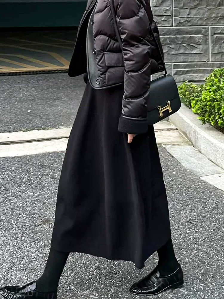 冬季黑色a字毛呢半身裙女2025新款秋冬款加厚裙子小个子鱼尾伞裙