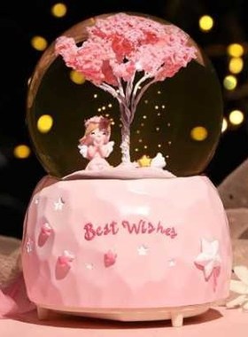 Rotating crystal ball automatically falling in the snow Love