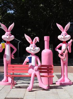 户外卡通玻璃钢足球兔子雕塑幼儿园学校球场体育馆景观装饰摆件