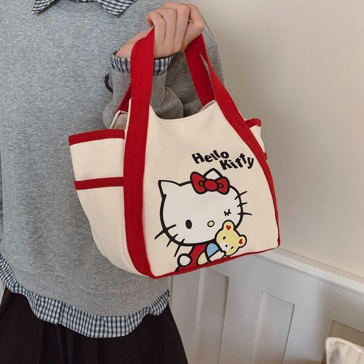 HelloKitty化妆包学生可爱大容量零钱包上班族百搭通勤帆布收纳包